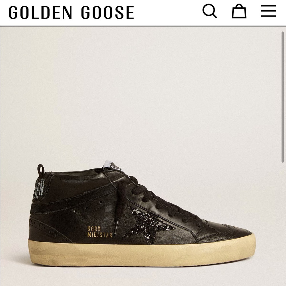 GOLDEN GOOSE
Women'Mid Star in black Zappa with black glitter star Sz 39
$695